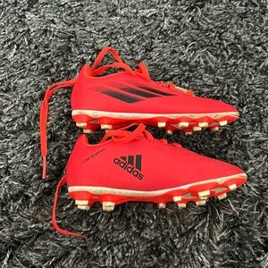 Kids’ adidas soccer cleats